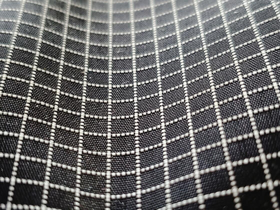 close of fabric with dotted squares